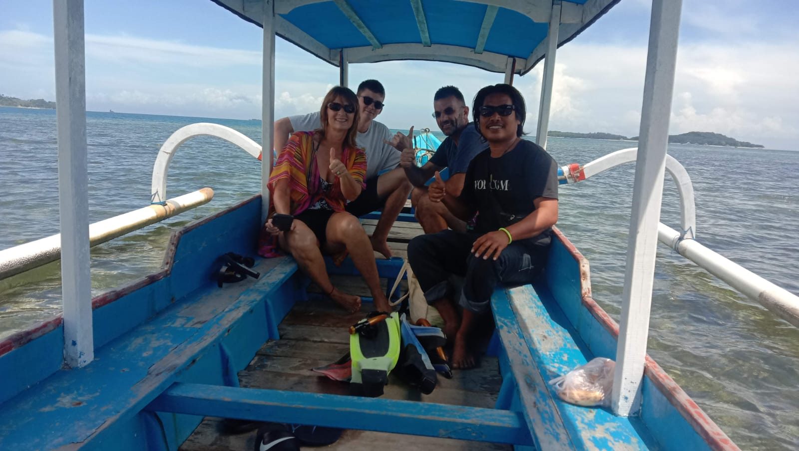 Diko with guests (boat) - Diko Transport and Tours
