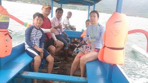 Diko with guests on a beach boat trip in Lombok
