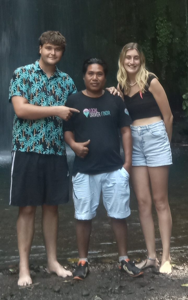 Diko with guests at a Lombok waterfall
